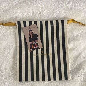 Lele Sadoughi Dust abag Black and Cream Striped Bag